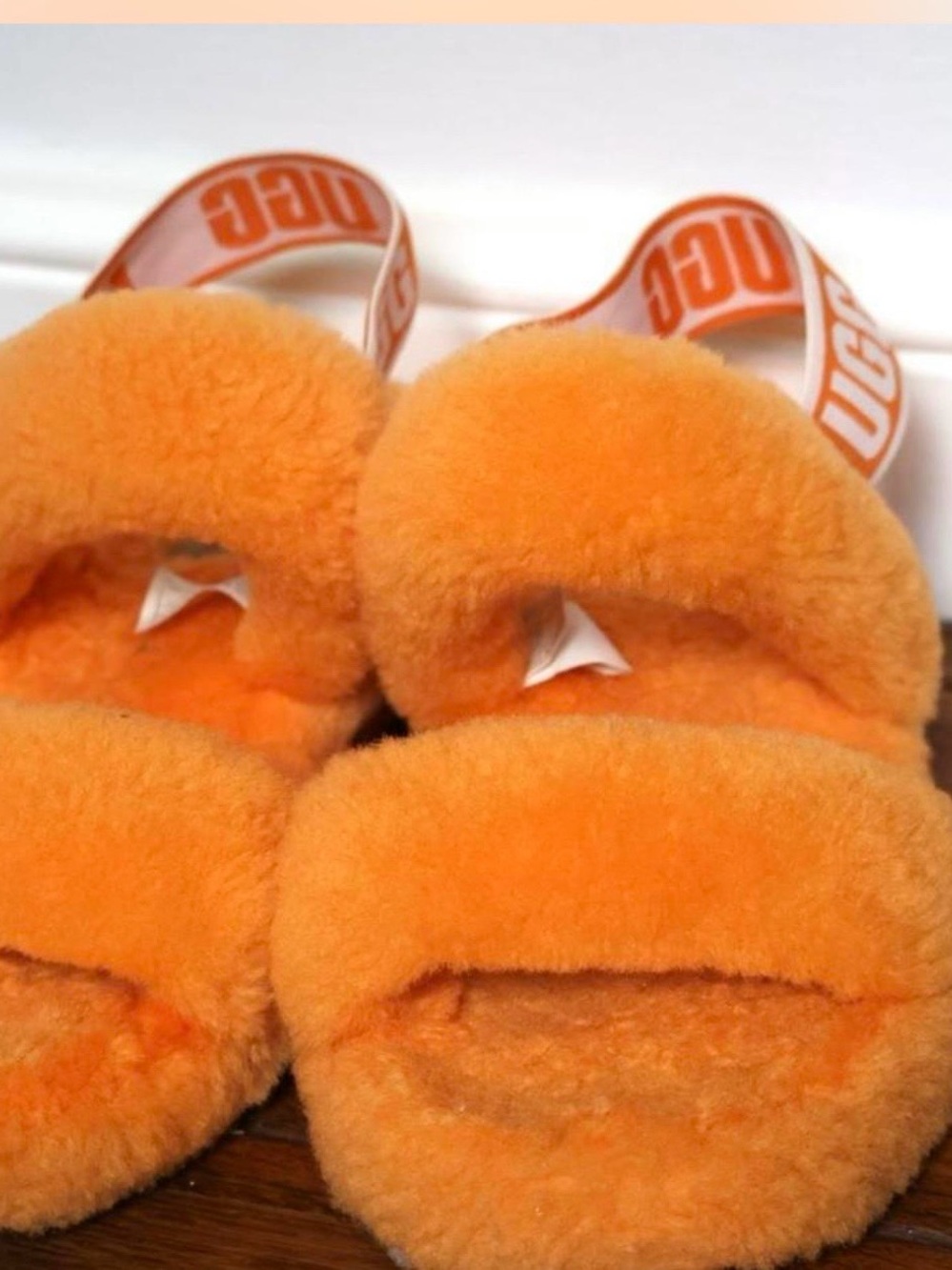 UGG Bright Orange Faux-Shearling Slide Sandals with Logo Strap